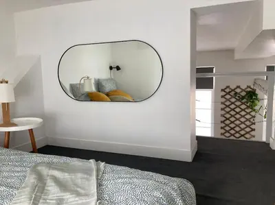 Un ou plusieurs lits dans un hébergement de l'établissement Duplex hypercentre avec parking