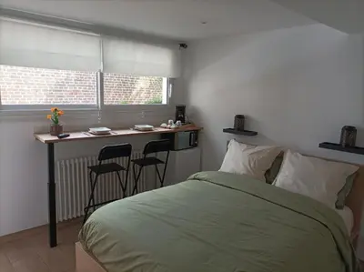 Un ou plusieurs lits dans un hébergement de l'établissement LE 16 CHAMBRES D'HÔTE