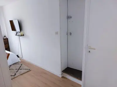 Télévision ou salle de divertissement dans l'établissement Le Sympathique