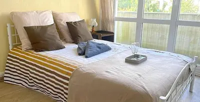 Un ou plusieurs lits dans un hébergement de l'établissement Votre chambre chez l'habitant dans la capitale de la Normandie