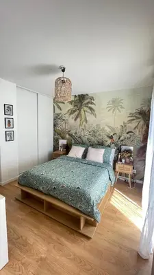 Un ou plusieurs lits dans un hébergement de l'établissement Appartement de charme Poissy