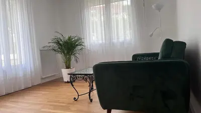 Coin salon dans l'établissement Maison dans un endroit calme