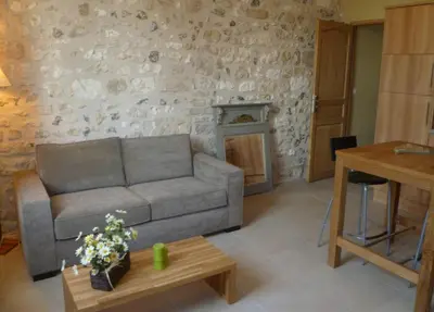 Coin salon dans l'établissement Le Clos de l'Eglise - Inès