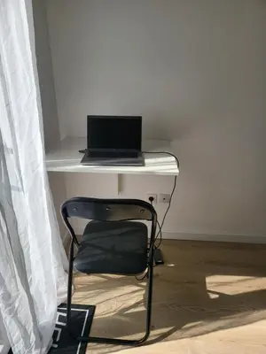 Télévision ou salle de divertissement dans l'établissement Studio proche gare Vernon Giverny terrasse Parking