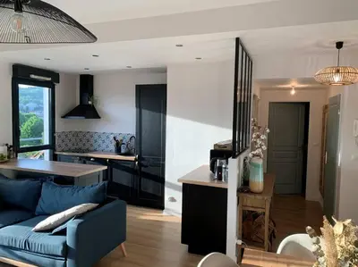 Coin salon dans l'établissement Appartement Rouen terrasse + parking