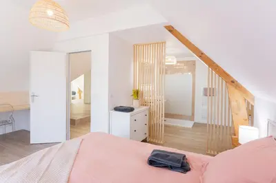 Un ou plusieurs lits dans un hébergement de l'établissement La Villa Maxine, vue mer et spa