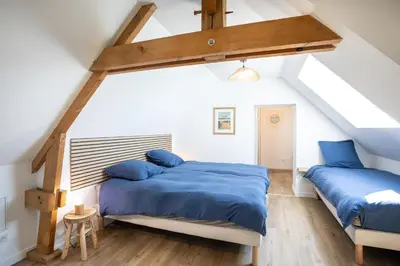 Un ou plusieurs lits dans un hébergement de l'établissement La Villa Maxine, vue mer et spa