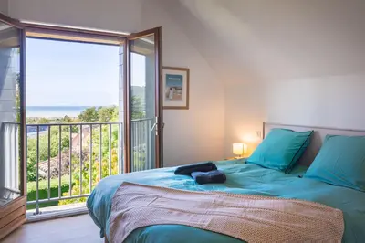 Un ou plusieurs lits dans un hébergement de l'établissement La Villa Maxine, vue mer et spa