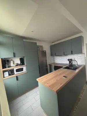 Cuisine ou kitchenette dans l'établissement Gîte les Tilleuls