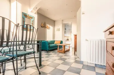 Cuisine ou kitchenette dans l'établissement maison jardin terrasse parking gratuit autour de la maison