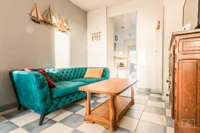Coin salon dans l'établissement maison jardin terrasse parking gratuit autour de la maison