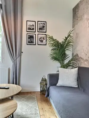 Coin salon dans l'établissement Beau Duplex proche Centre Gare