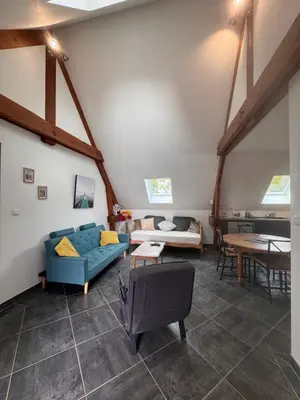 Coin salon dans l'établissement Appart à la ferme, chez Shoopie
