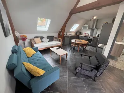 Coin salon dans l'établissement Appart à la ferme, chez Shoopie
