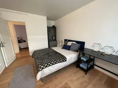 Un ou plusieurs lits dans un hébergement de l'établissement Appartement 4 pers. avec parking gratuit sur place Petit Couronne