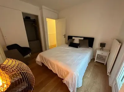 Un ou plusieurs lits dans un hébergement de l'établissement Appartement 4 pers. avec parking gratuit sur place Petit Couronne
