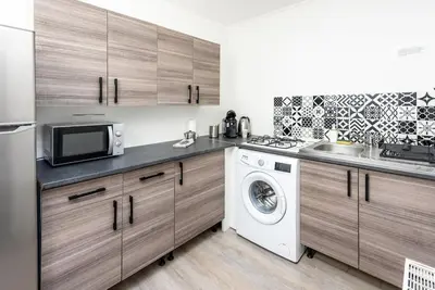 Cuisine ou kitchenette dans l'établissement Le Gévaudan