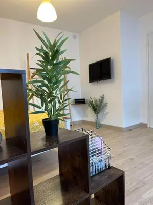 Télévision ou salle de divertissement dans l'établissement Appartement neuf entièrement équipé proche centre