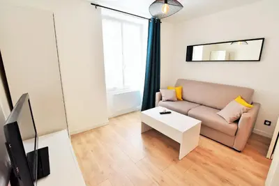 Télévision ou salle de divertissement dans l'établissement Appartement au coeur de la ville de Taverny