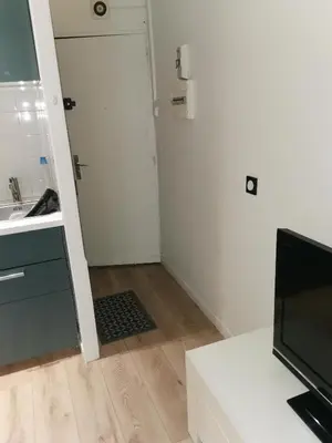 Télévision ou salle de divertissement dans l'établissement Appartement au coeur de la ville de Taverny