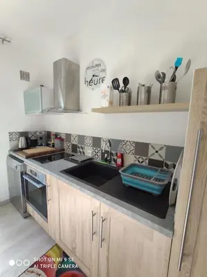 Cuisine ou kitchenette dans l'établissement Studio Tribord Le Tréport - vue mer & falaises