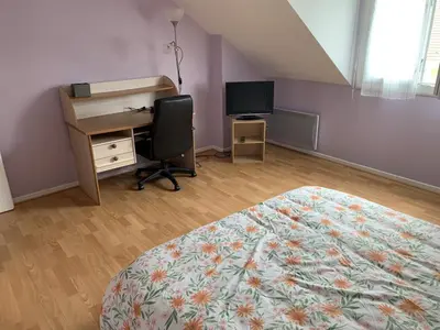 Un ou plusieurs lits dans un hébergement de l'établissement Chambres d'hôtes dans le Val d'Oise