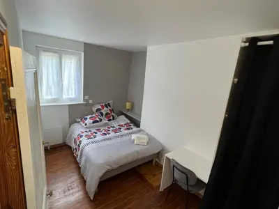 Un ou plusieurs lits dans un hébergement de l'établissement Maison de ville à 2 pas de Rouen