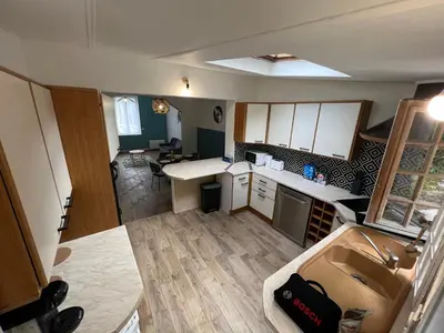 Cuisine ou kitchenette dans l'établissement Maison de ville à 2 pas de Rouen