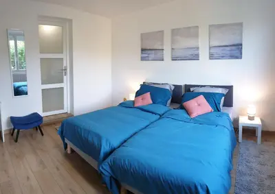 Un ou plusieurs lits dans un hébergement de l'établissement Havre champêtre, maison et chalet