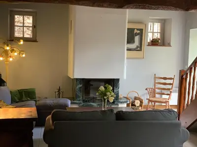 Coin salon dans l'établissement Maison de Village Vexin site classé 1h Paris et Normandie grand jardin