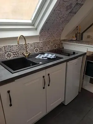 Cuisine ou kitchenette dans l'établissement La Cabane du Pêcheur