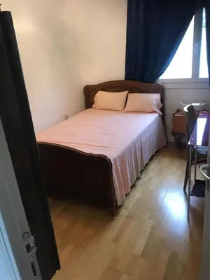 Un ou plusieurs lits dans un hébergement de l'établissement Beauvais chambre 1