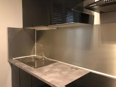 Cuisine ou kitchenette dans l'établissement Beauvais chambre 1