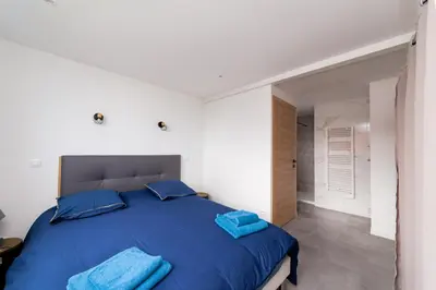 Un ou plusieurs lits dans un hébergement de l'établissement Villa Belle Vue Le Tréport - familiale et spacieuse