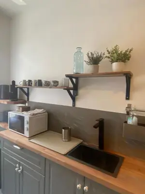 Cuisine ou kitchenette dans l'établissement Bienvenue à la réderie d’Amiens