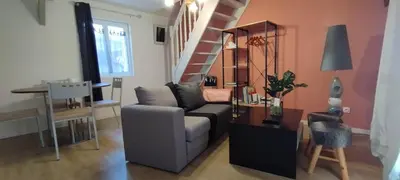 Coin salon dans l'établissement Le logis de la chouette