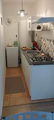 Cuisine ou kitchenette dans l'établissement Le logis de la chouette