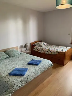 Un ou plusieurs lits dans un hébergement de l'établissement Chambres d'hôtes