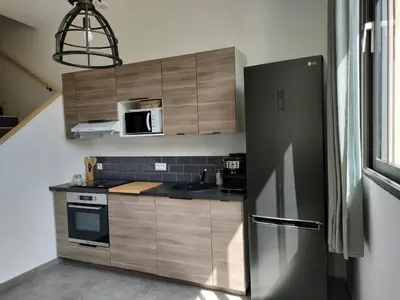 Cuisine ou kitchenette dans l'établissement La Forge - Ancien atelier devenu cocon lumineux à Asnières sur Oise