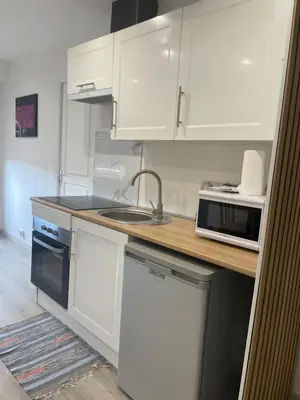 Cuisine ou kitchenette dans l'établissement Home chic et renové
