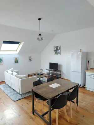 Télévision ou salle de divertissement dans l'établissement Cosy appartement 2 chambres