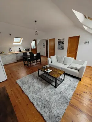Coin salon dans l'établissement Cosy appartement 2 chambres