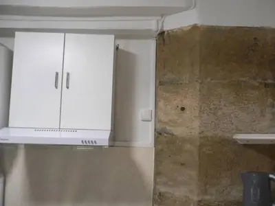Cuisine ou kitchenette dans l'établissement En plein centre historique et piétonnier