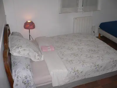 Un ou plusieurs lits dans un hébergement de l'établissement Invitation au voyage