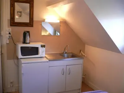 Cuisine ou kitchenette dans l'établissement Invitation au voyage
