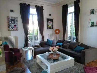 Coin salon dans l'établissement Bed & Breakfast à 20mn direct St Lazare en Train