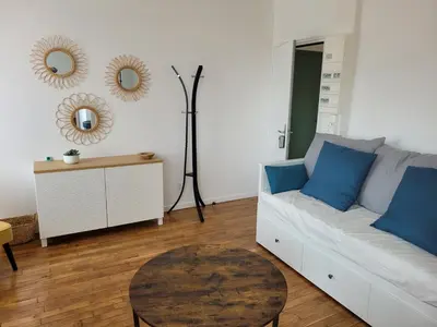 Coin salon dans l'établissement Appartement cosy