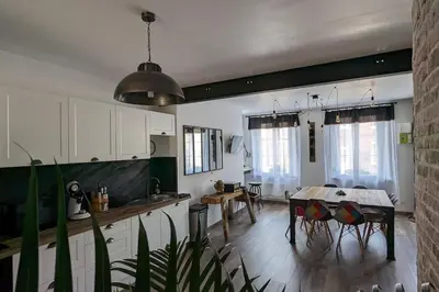 Télévision ou salle de divertissement dans l'établissement Chez Pépère