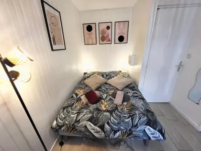 Un ou plusieurs lits dans un hébergement de l'établissement Studio cosy au cœur du quartier Saint-Pierre