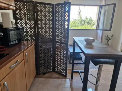 Cuisine ou kitchenette dans l'établissement City Break plein centre & gare